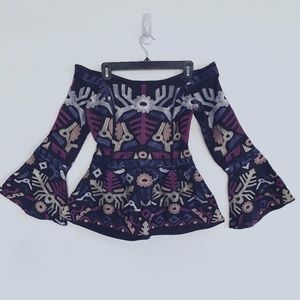 Venus brand, off-the-shoulder long sleeve top.